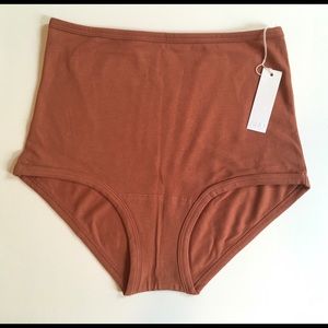 Shop ARQ underwear in terra cotta